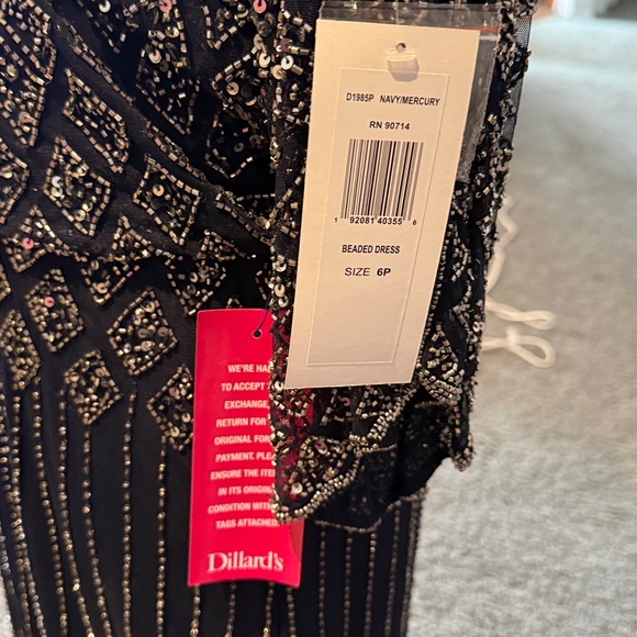 NWT Pisarro Nights beaded split sleeve gown.
6P Navy Blue - Picture 7 of 7